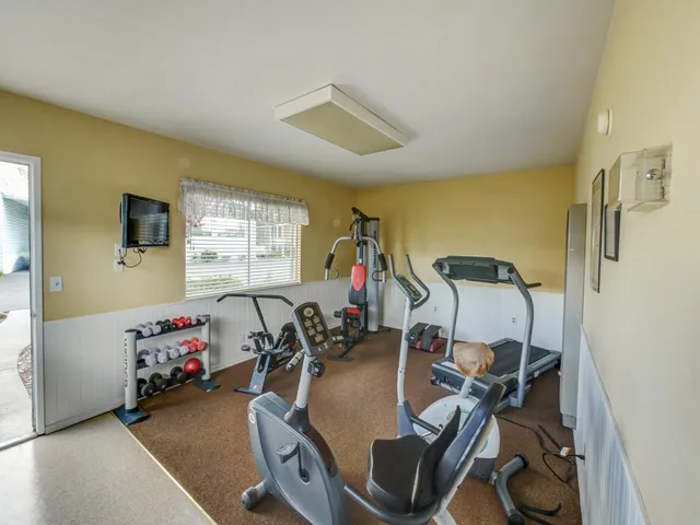 a view of a room with gym equipment