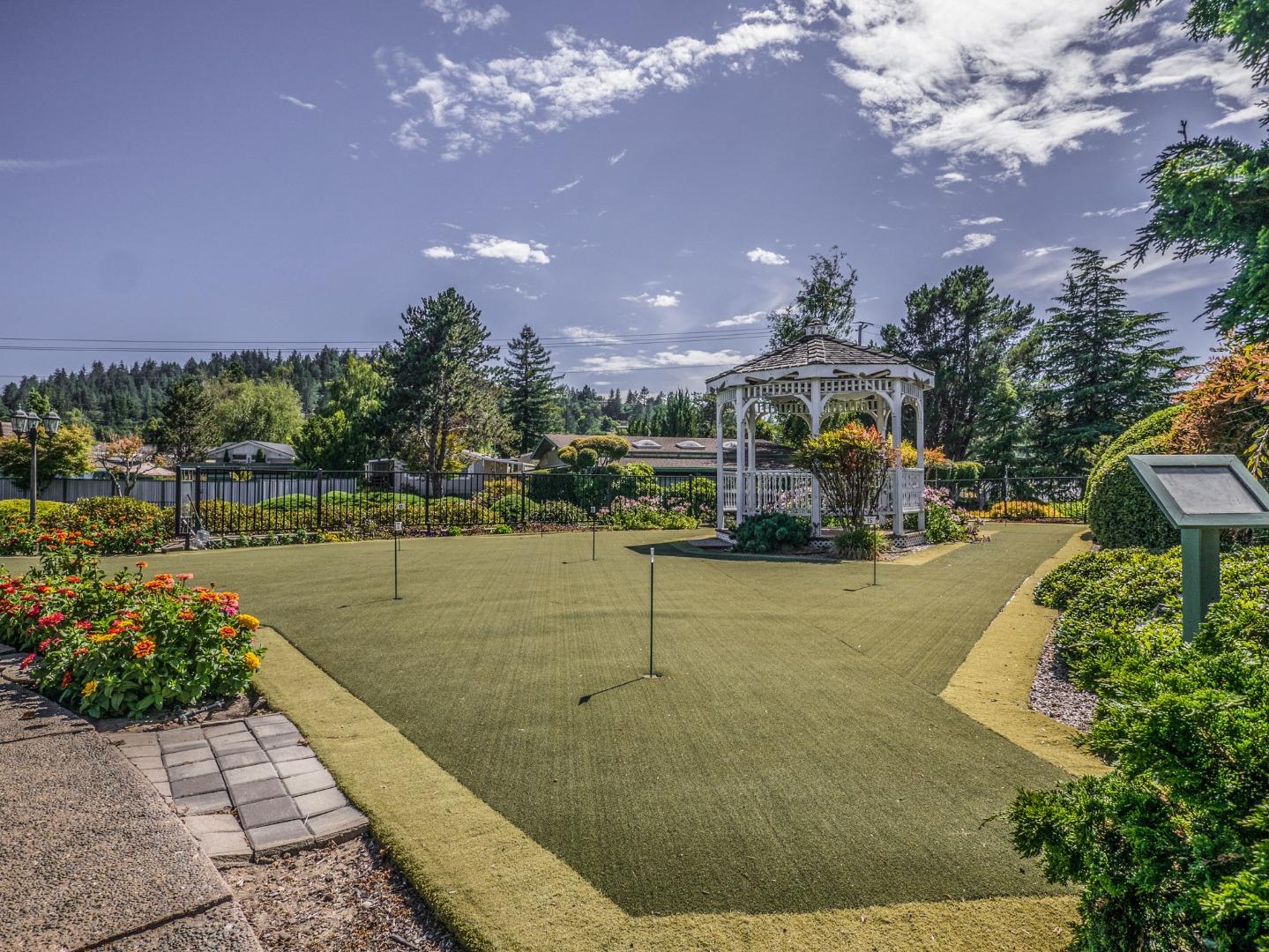 225 Mt Hermon Road, Unit 37 Scotts Valley, CA 95066 - Photo 40 of 44 a swimming pool with yard in front of the house