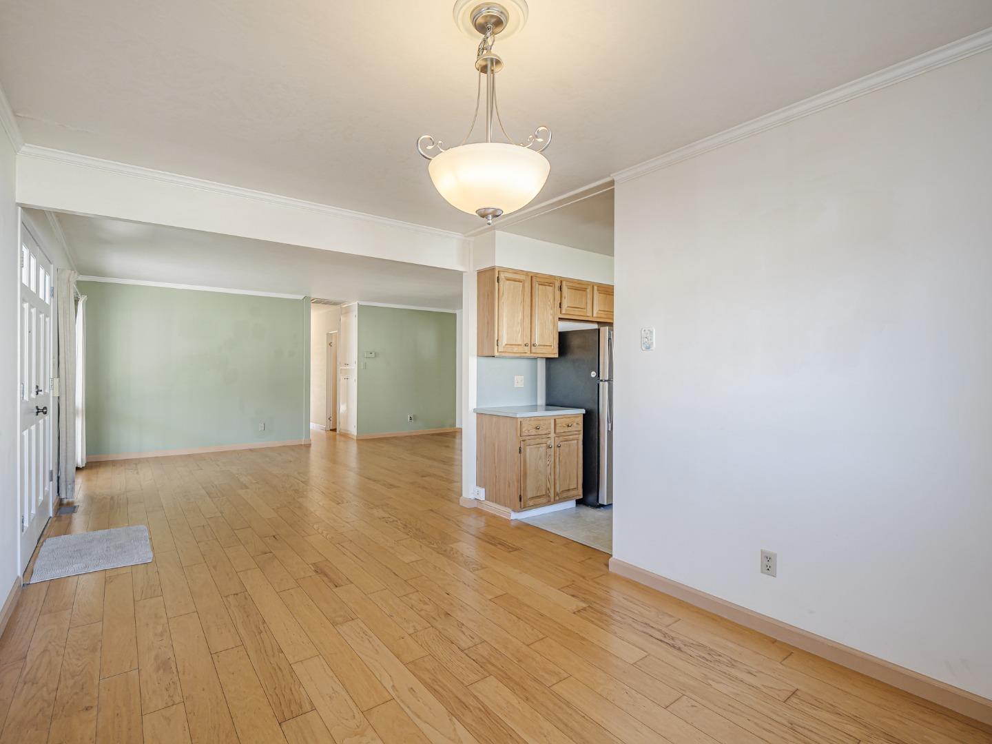 225 Mt Hermon Road, Unit 37 Scotts Valley, CA 95066 - Photo 10 of 44 a view of a room with wooden floor and a ceiling fan
