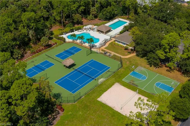 an aerial view of a pool yard patio and outdoor seating
