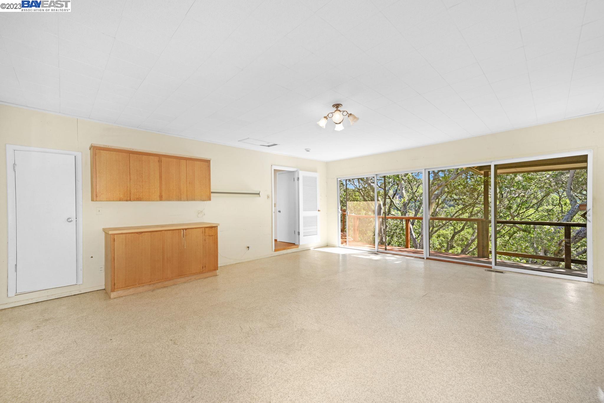 Undisclosed Address Orinda, CA 94563 - Photo 11 of 32 a view of an empty room with a window