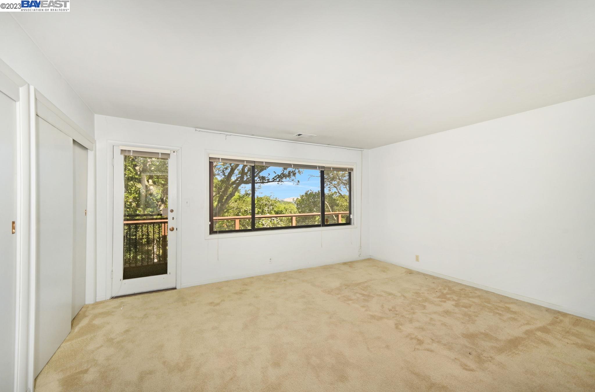 Undisclosed Address Orinda, CA 94563 - Photo 14 of 32 an empty room with windows