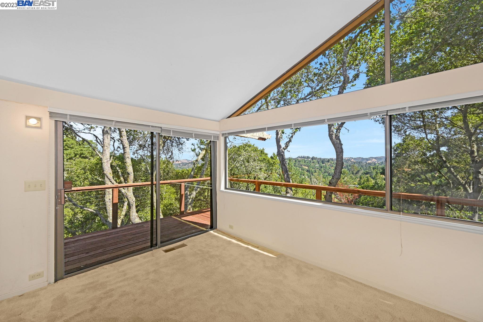 Undisclosed Address Orinda, CA 94563 - Photo 18 of 32 a view of an outdoor space with a large window