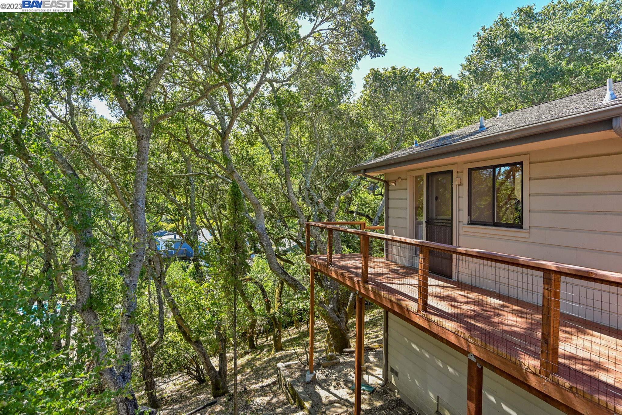 Undisclosed Address Orinda, CA 94563 - Photo 23 of 32 a view of a house with a tree