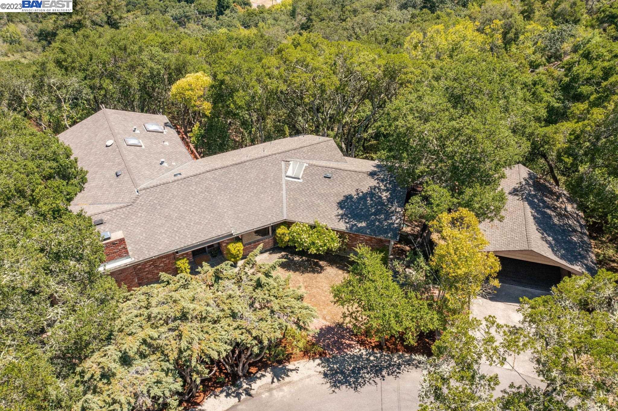 Undisclosed Address Orinda, CA 94563 - Photo 27 of 32 an aerial view of a house with a yard