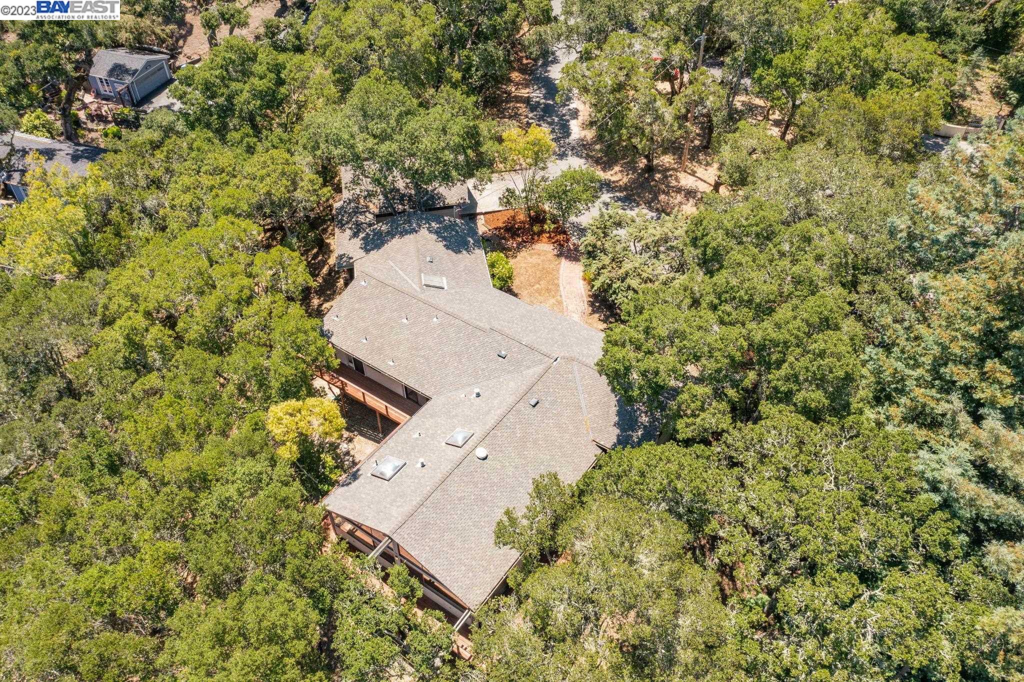 Undisclosed Address Orinda, CA 94563 - Photo 30 of 32 an aerial view of a house with a yard