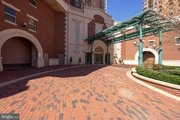 a view of a building with brick walls