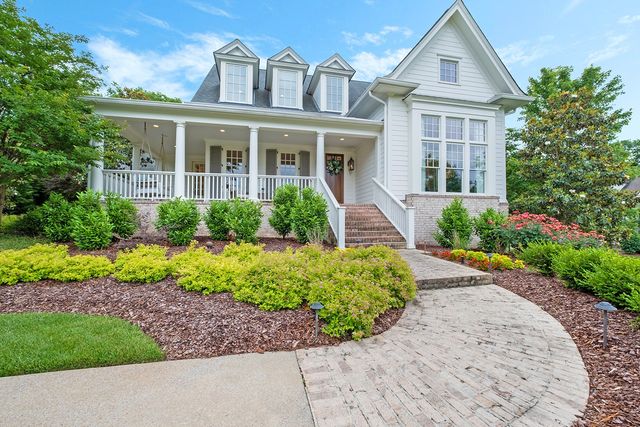 a view of door with wooden floor