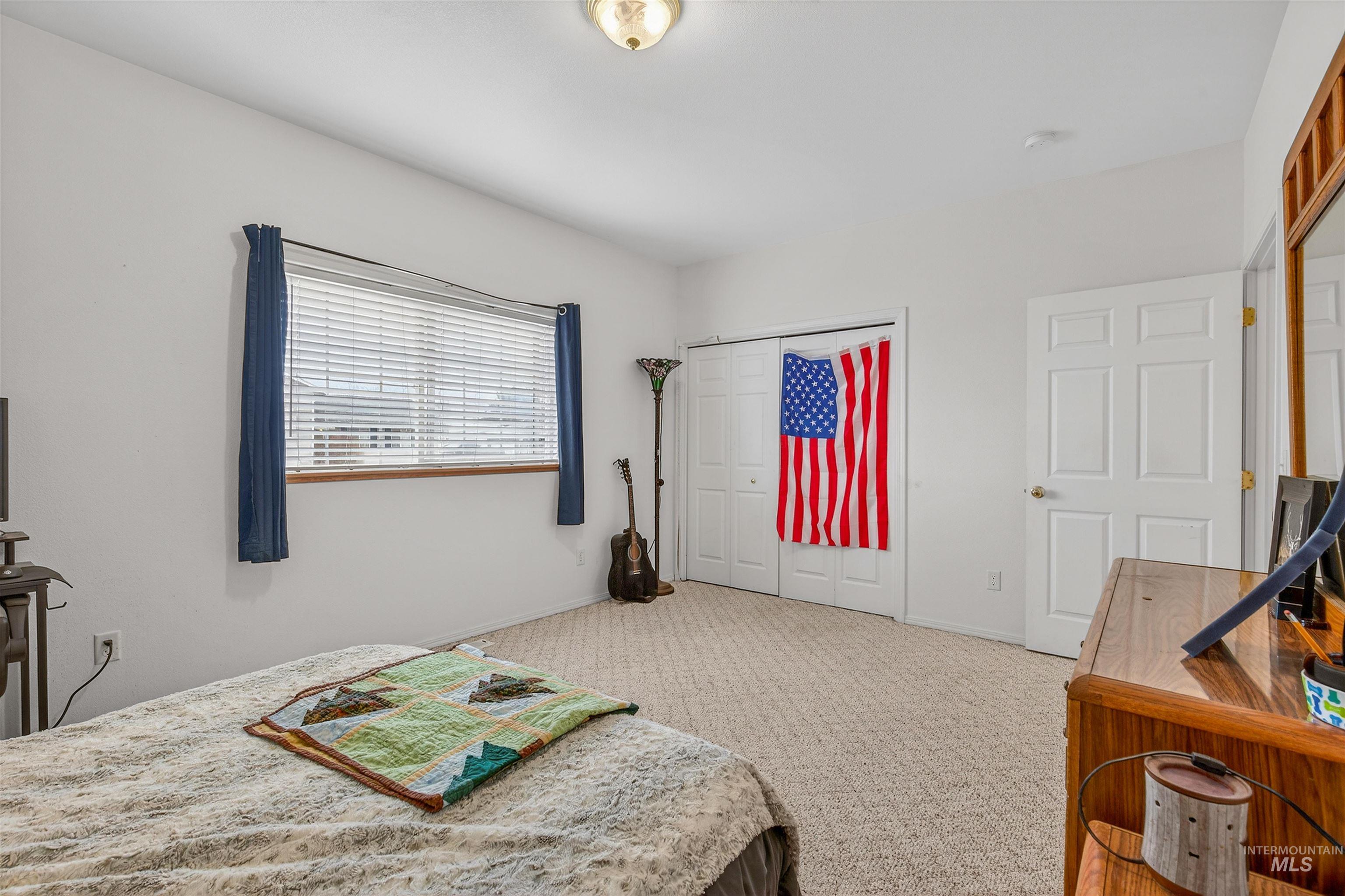 3737 19th Street Lewiston, ID 83501 - Photo 22 of 40 Bedroom with carpet floors and a closet