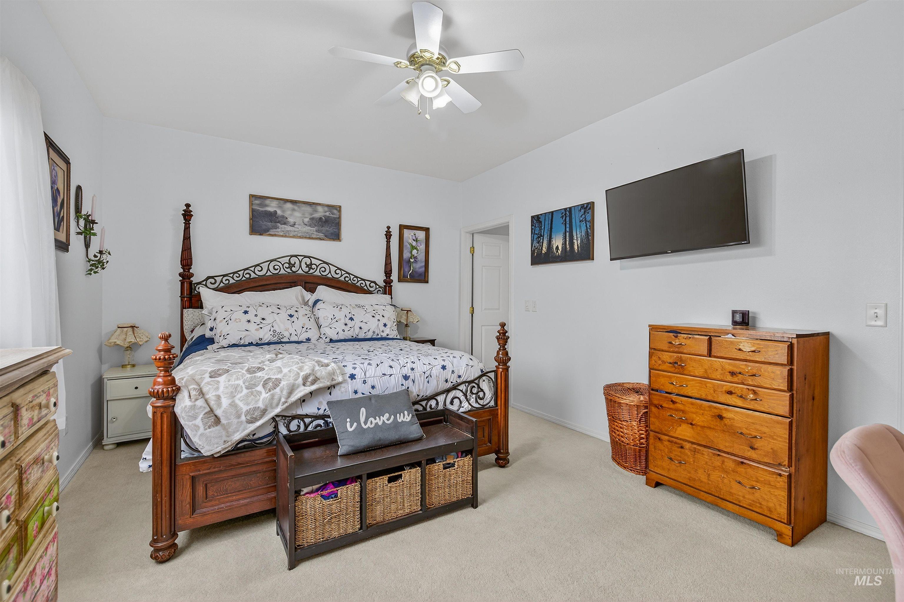 3737 19th Street Lewiston, ID 83501 - Photo 25 of 40 Bedroom featuring light colored carpet and a ceiling fan