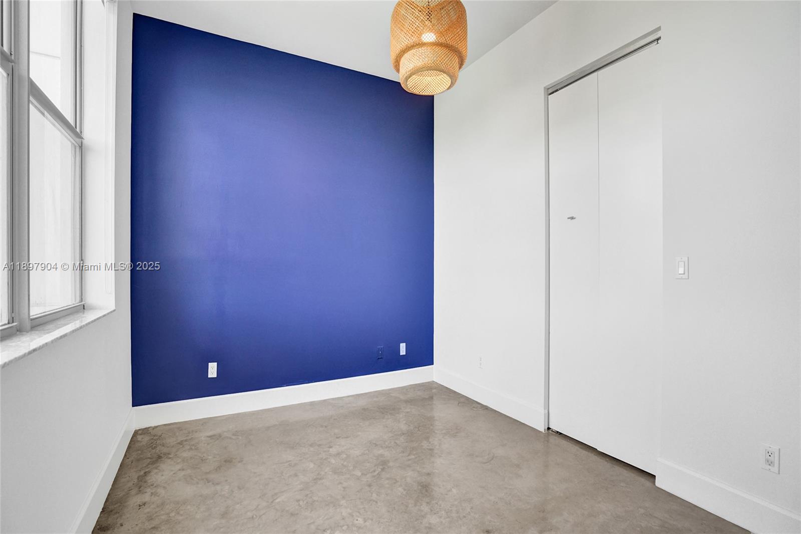 716 Southeast 12th Street, Unit 13 Fort Lauderdale, FL 33316 - Photo 25 of 45 a view of an empty room with a window