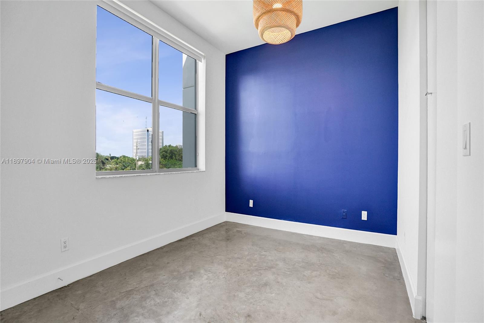 716 Southeast 12th Street, Unit 13 Fort Lauderdale, FL 33316 - Photo 26 of 45 a view of an empty room with a window