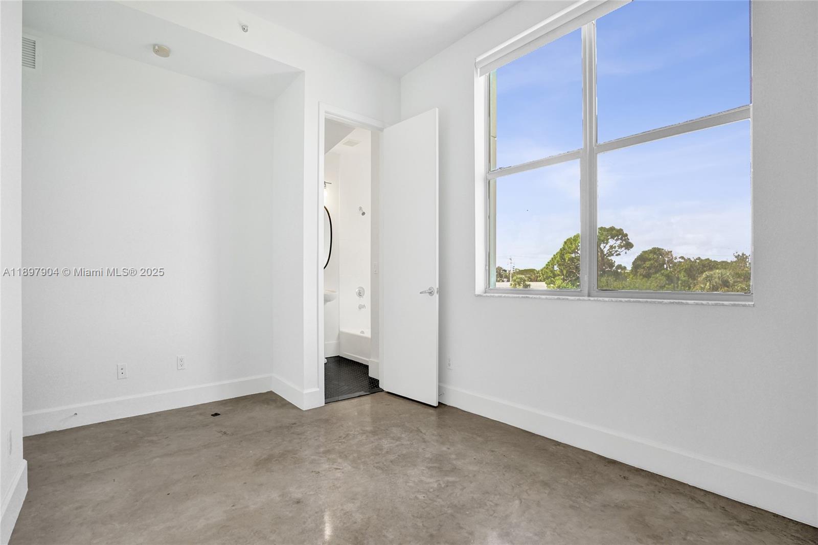 716 Southeast 12th Street, Unit 13 Fort Lauderdale, FL 33316 - Photo 30 of 45 a view of an empty room