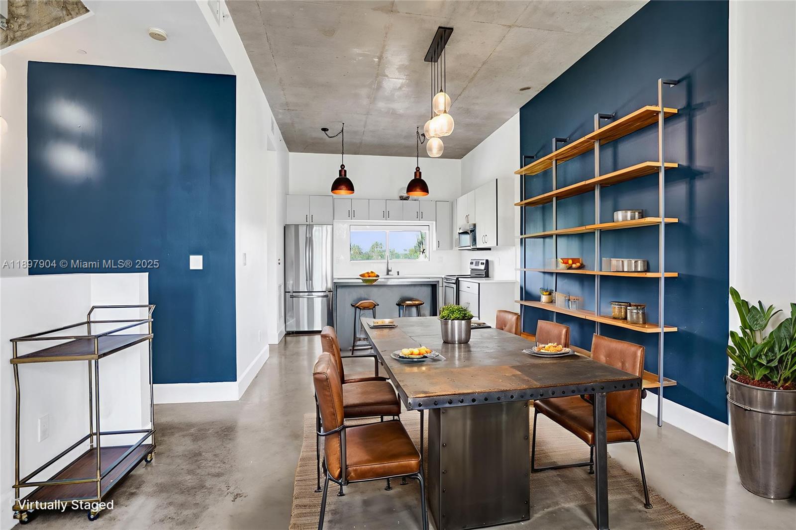 716 Southeast 12th Street, Unit 13 Fort Lauderdale, FL 33316 - Photo 3 of 45 a view of a workspace with furniture