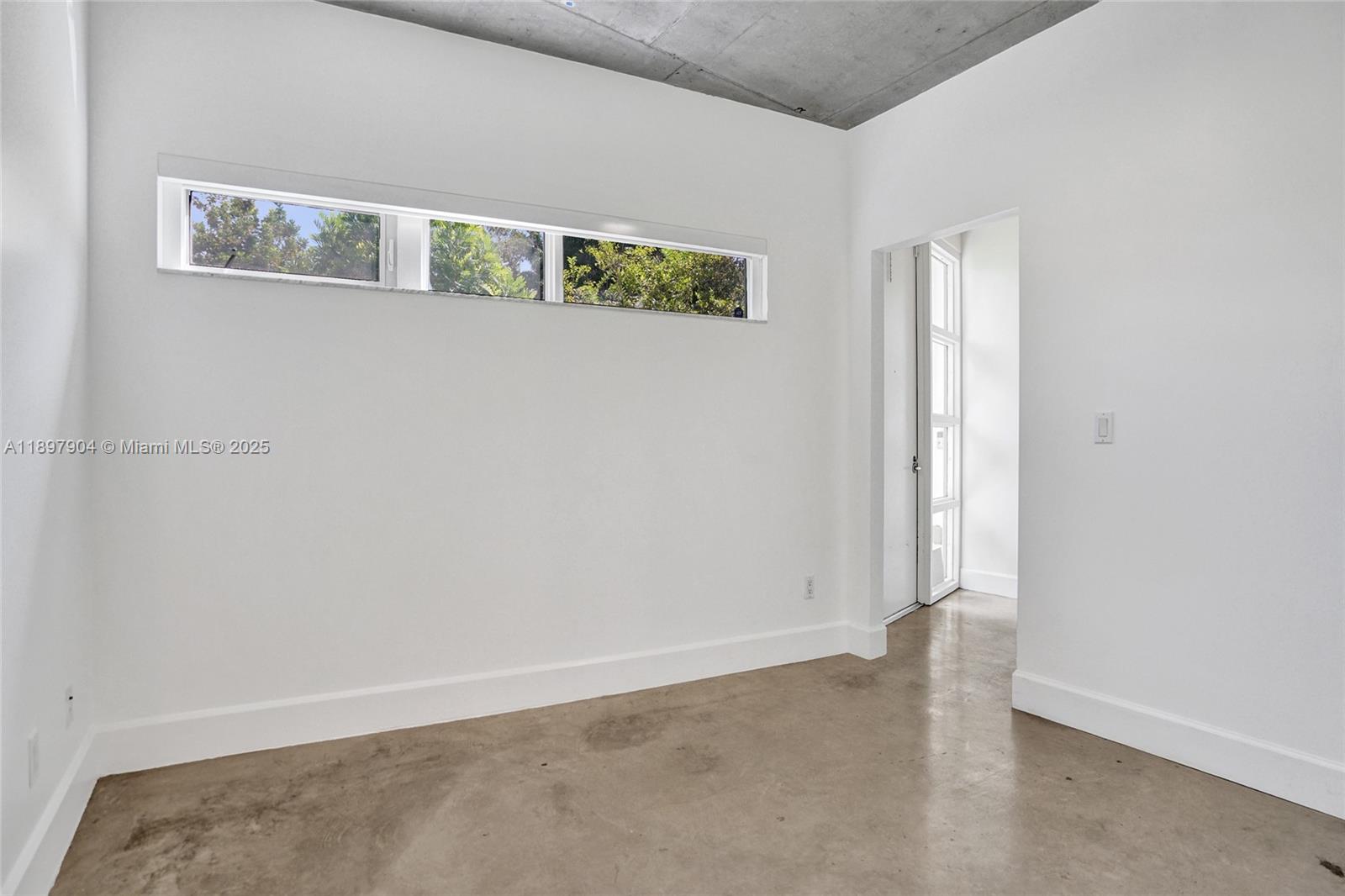 716 Southeast 12th Street, Unit 13 Fort Lauderdale, FL 33316 - Photo 32 of 45 a view of an empty room
