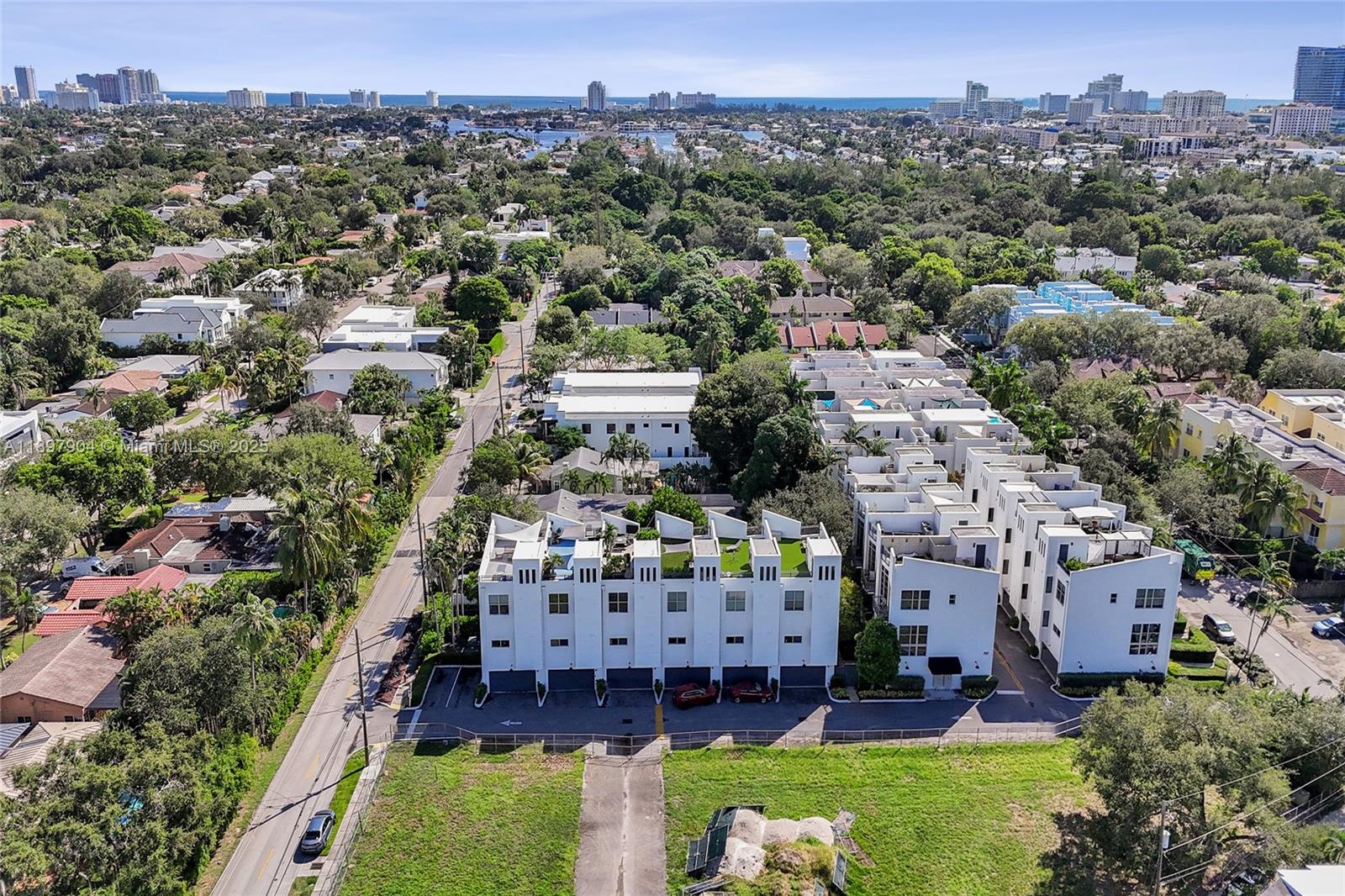 716 Southeast 12th Street, Unit 13 Fort Lauderdale, FL 33316 - Photo 39 of 45 an aerial view of a house with a yard