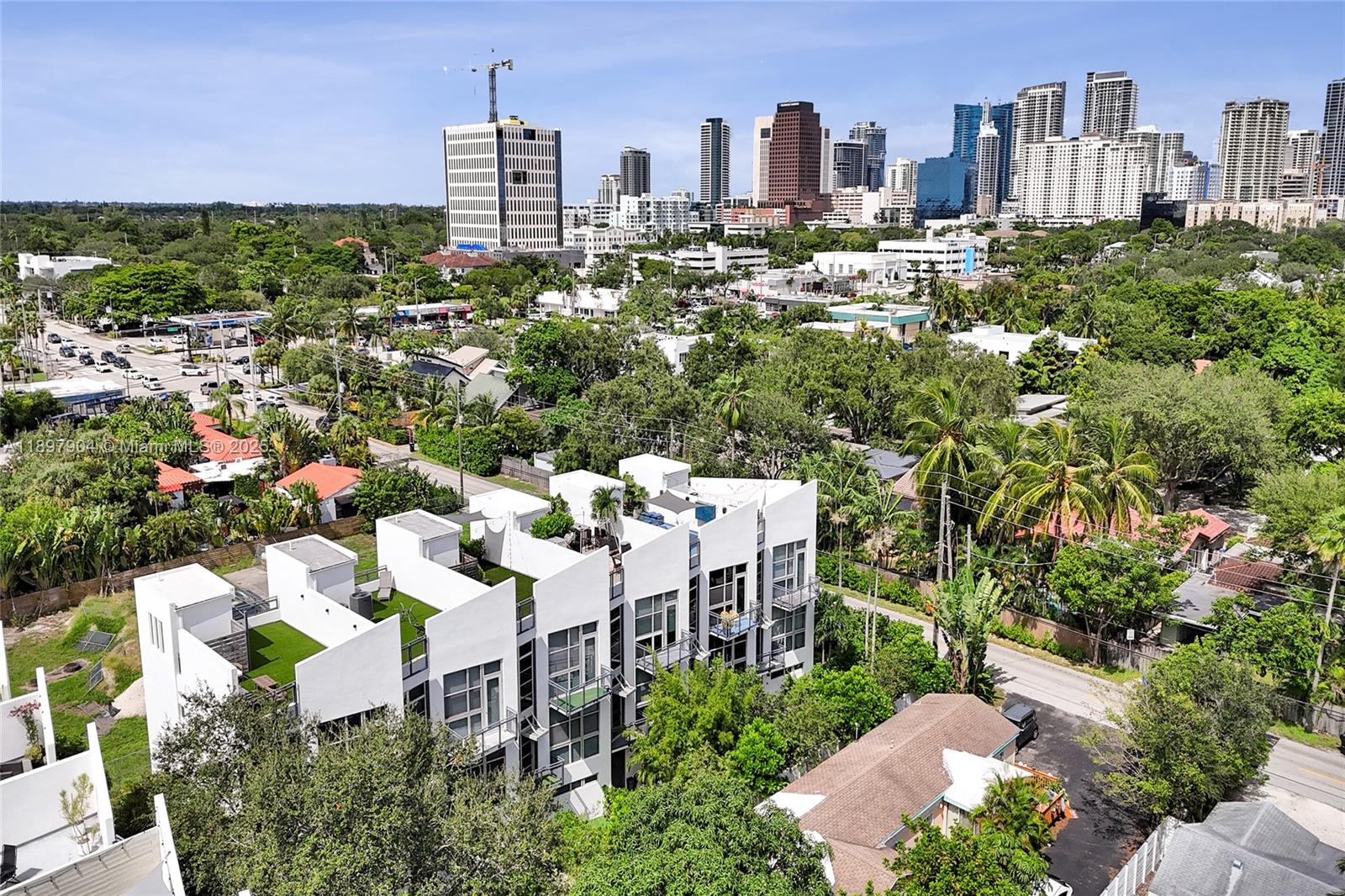 716 Southeast 12th Street, Unit 13 Fort Lauderdale, FL 33316 - Photo 41 of 45 a picture of houses with city view