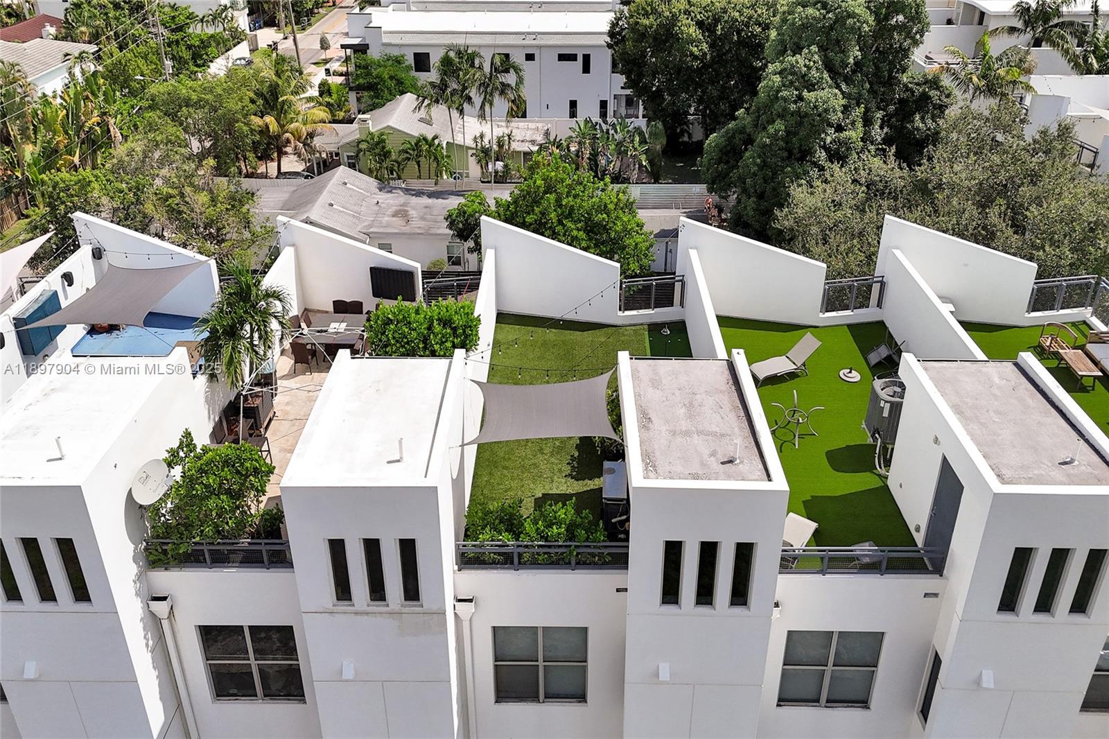 716 Southeast 12th Street, Unit 13 Fort Lauderdale, FL 33316 - Photo 43 of 45 an aerial view of multiple houses with outdoor space