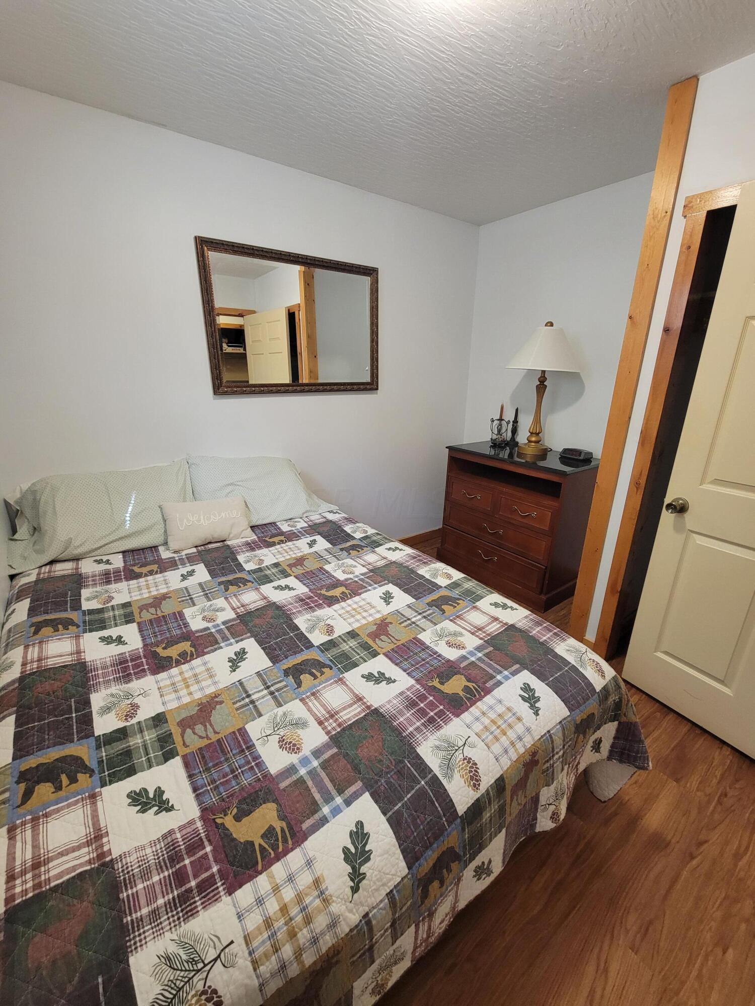 10448 Rich Hollow Road Southwest Lancaster, OH 43130 - Photo 11 of 27 Evergreen Cabin bedroom, newly painted