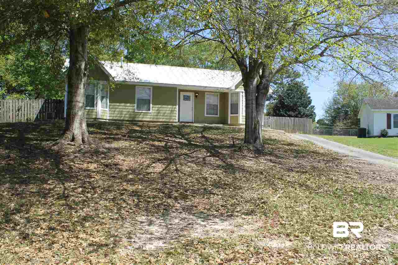 1700 Chuckwagon Court Semmes, AL 36575 - Photo 14 of 15 Shaded Front Yard