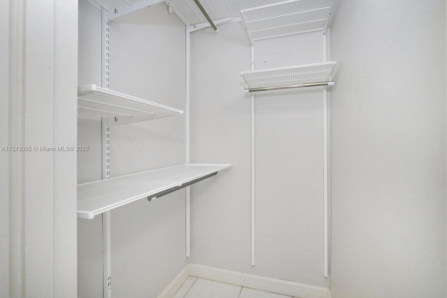 6310 Southwest 79th Street, Unit 18 South Miami, FL 33143 - Photo 11 of 16 a view of walk in closet