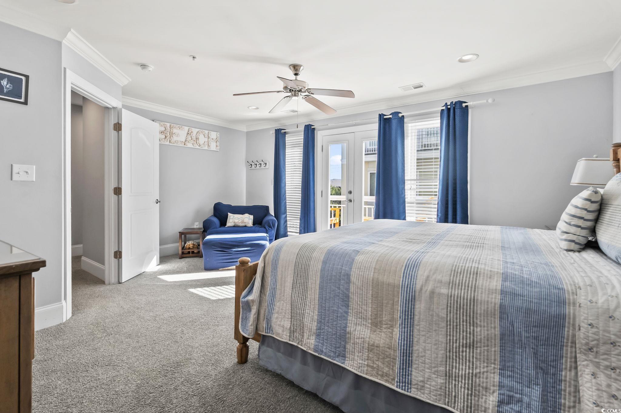 7401 North Ocean Boulevard, Unit 5 Myrtle Beach, SC 29572 - Photo 13 of 34 Carpeted bedroom featuring ornamental molding, french doors, access to exterior, and ceiling fan