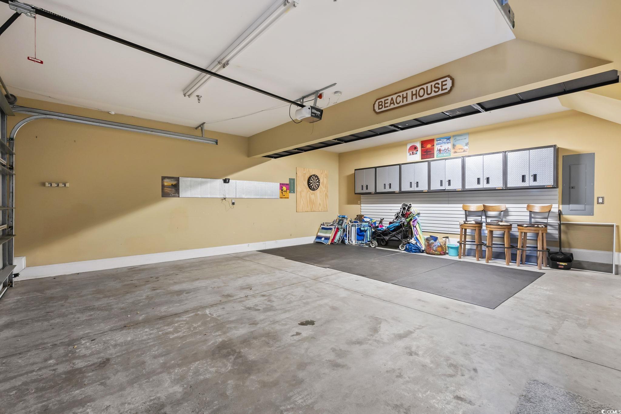 7401 North Ocean Boulevard, Unit 5 Myrtle Beach, SC 29572 - Photo 27 of 34 Garage with baseboards