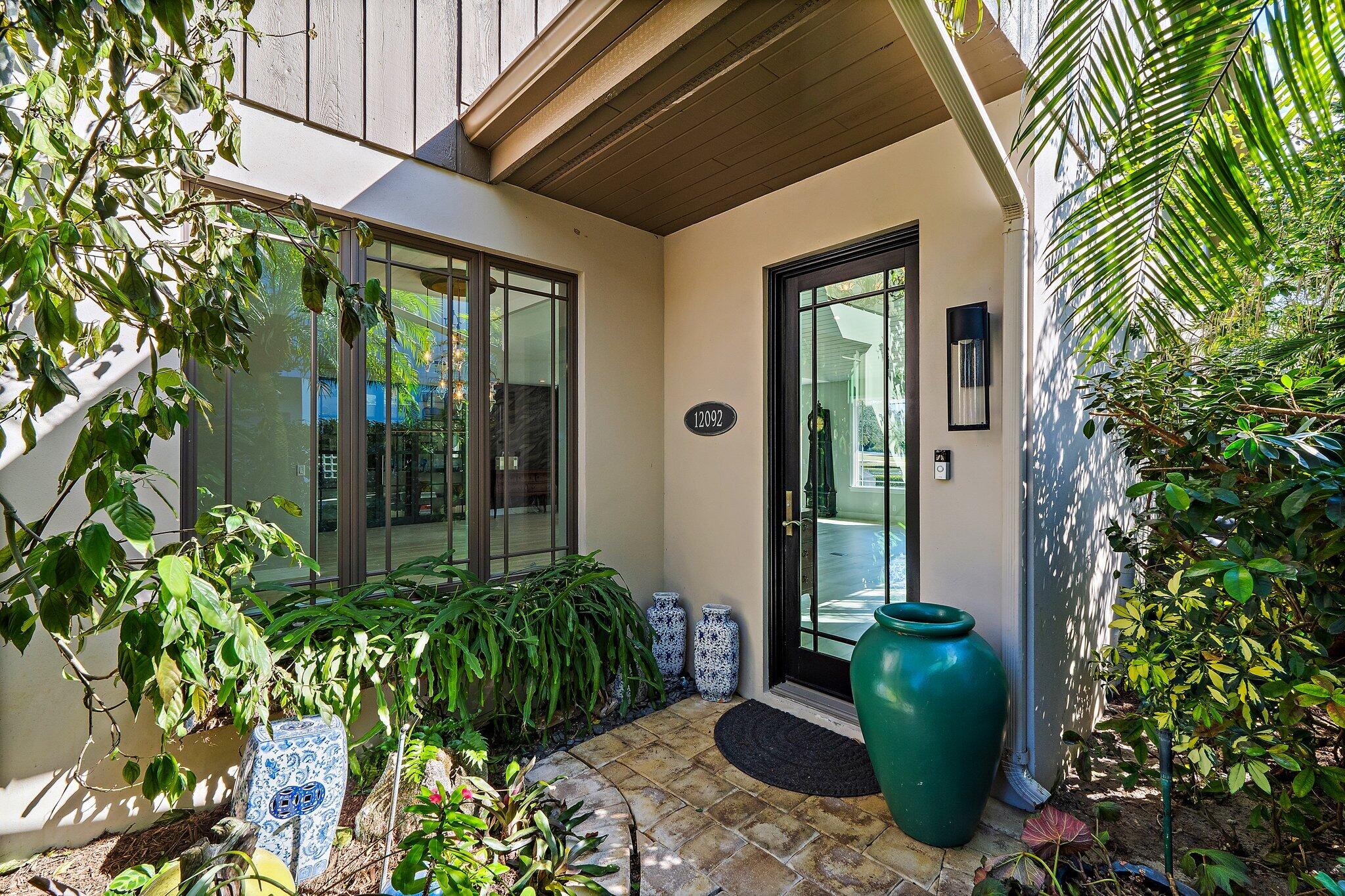 12092 Southeast Birkdale Run Jupiter, FL 33469 - Photo 1 of 52 Exterior Front Entry