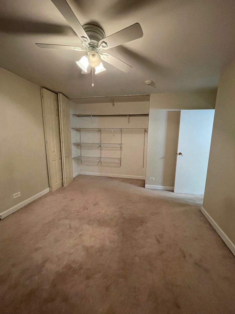 430 Walnut Creek Road, Unit 2306 Lisle, IL 60532 - Photo 4 of 14 a view of empty room