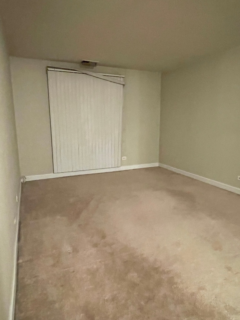 430 Walnut Creek Road, Unit 2306 Lisle, IL 60532 - Photo 6 of 14 a view of an empty room