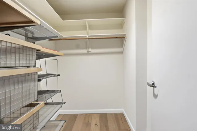 a view of a room with racks on the wall