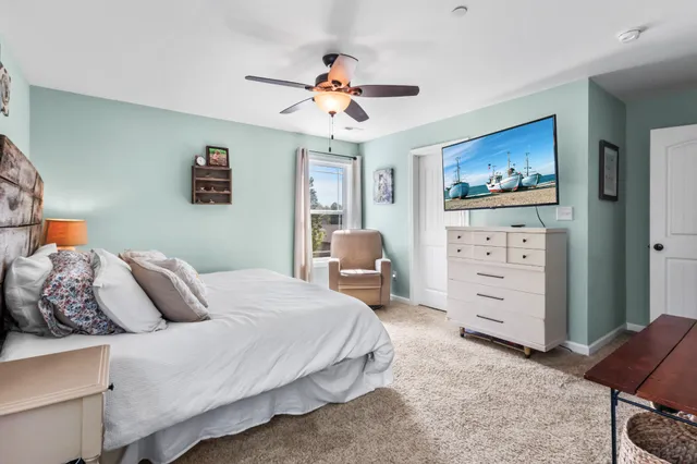 a bedroom with a bed and furniture