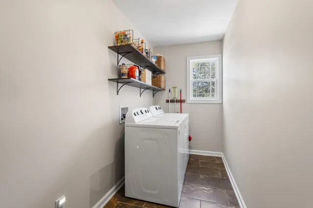 a utility room with dryer and washer