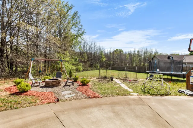 a view of a swimming pool with a lounge chairs