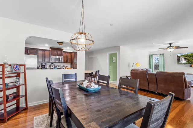 a view of a dining room with furniture