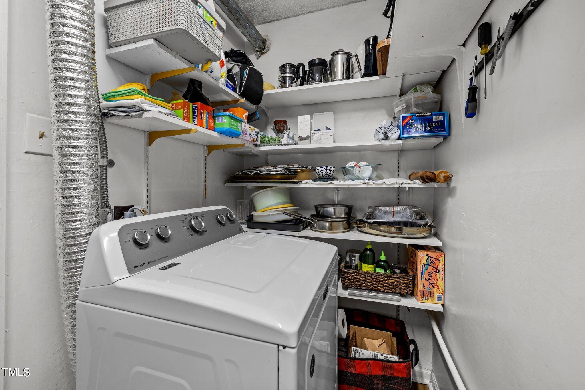 1917 Front Street, Unit 4C Durham, NC 27705 - Photo 36 of 53 a utility room with dryer washer and other items