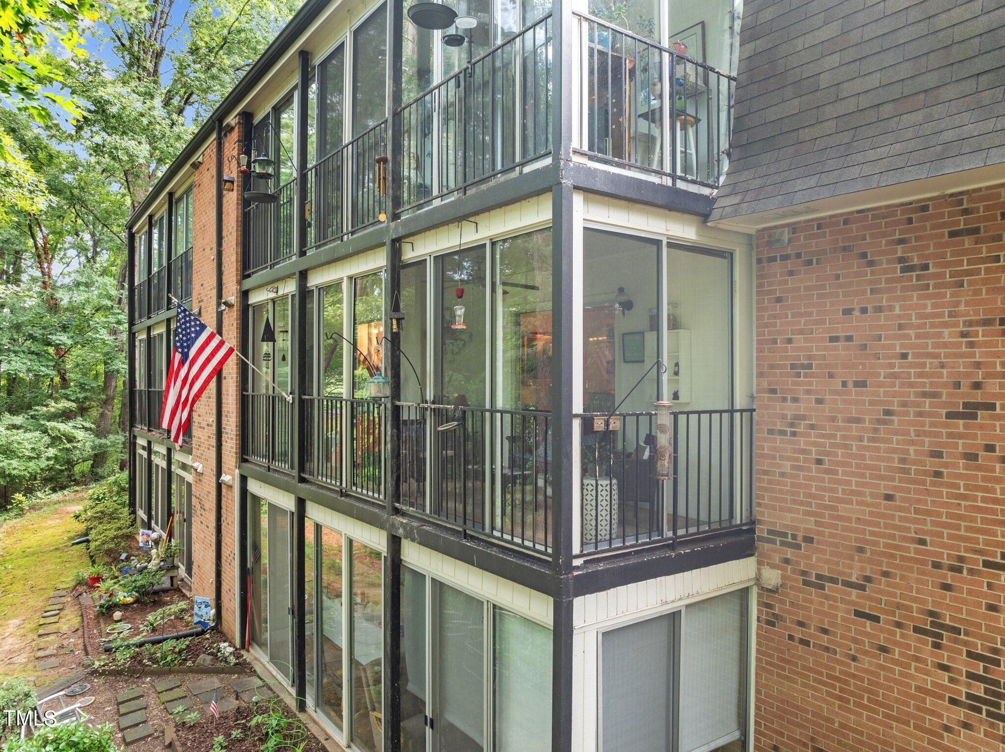 1917 Front Street, Unit 4C Durham, NC 27705 - Photo 39 of 53 a view of a brick house with a large windows