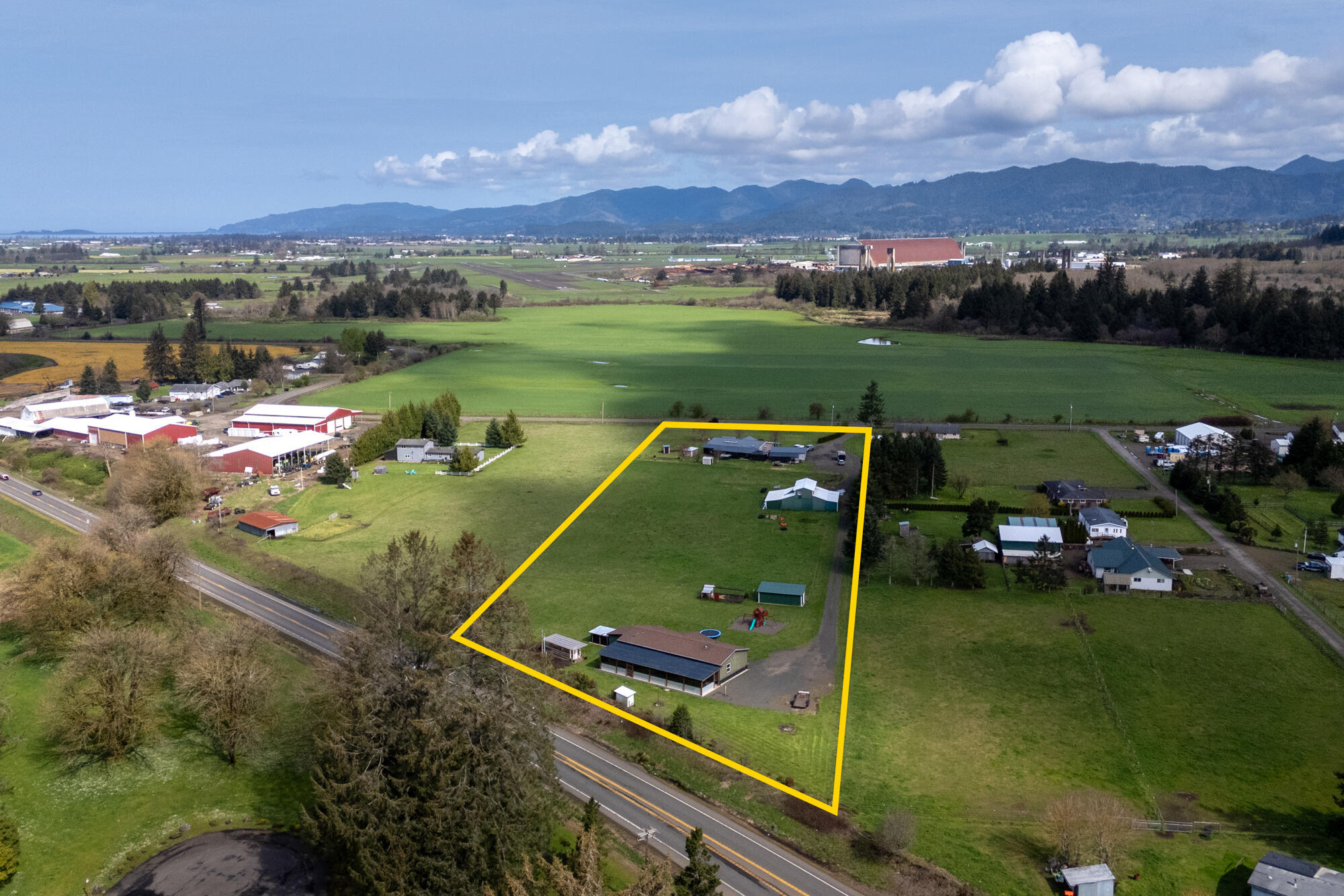 7400 South Prairie Road Tillamook, OR 97141 - Photo 61 of 62 an aerial view of a golf course with chairs