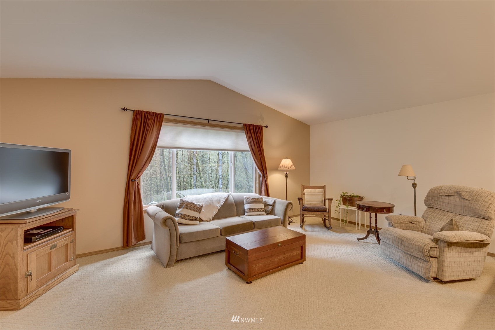 8322 Skinner Road Granite Falls, WA 98252 - Photo 14 of 40 a living room with furniture and a flat screen tv