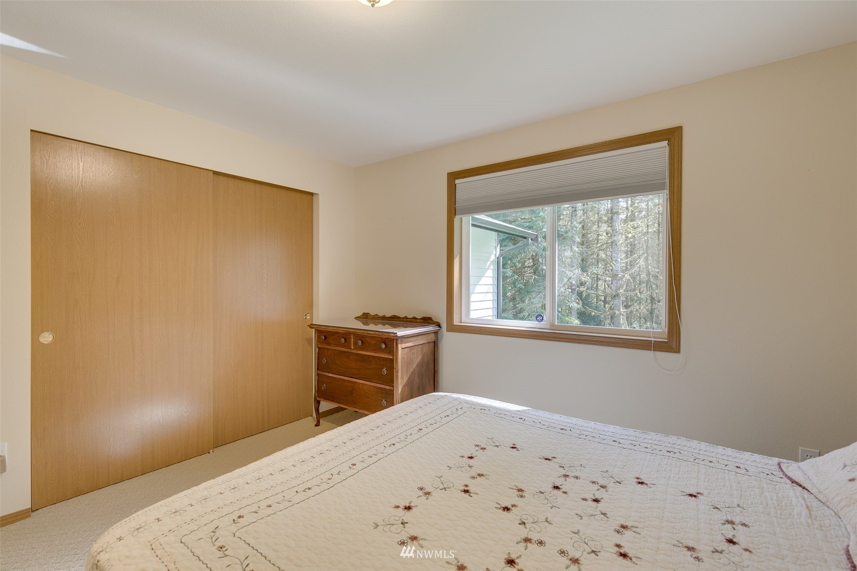 8322 Skinner Road Granite Falls, WA 98252 - Photo 20 of 40 a bedroom with a bed and a window
