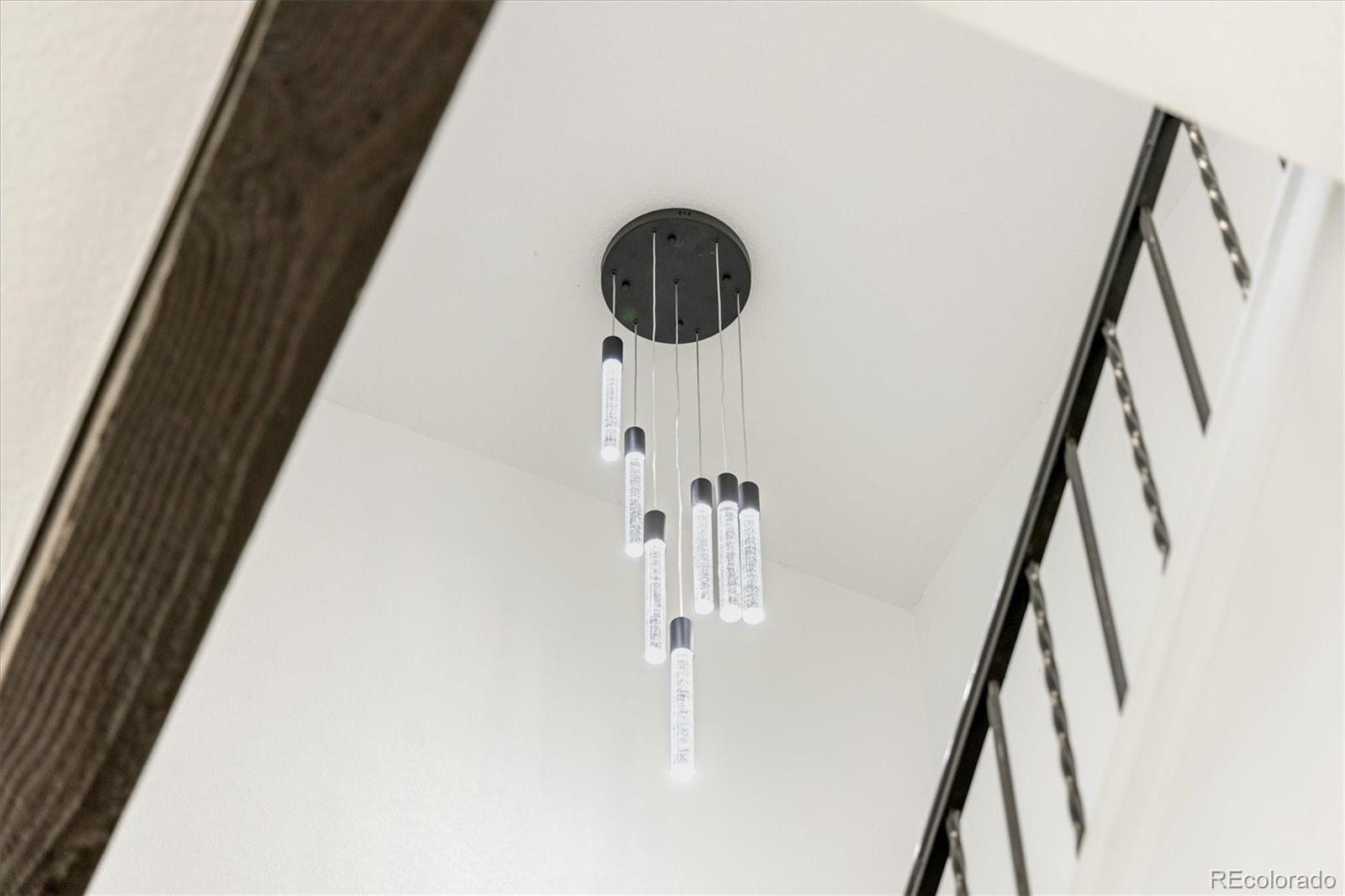 8612 Carr Loop Arvada, CO 80005 - Photo 11 of 35 a view of a staircase