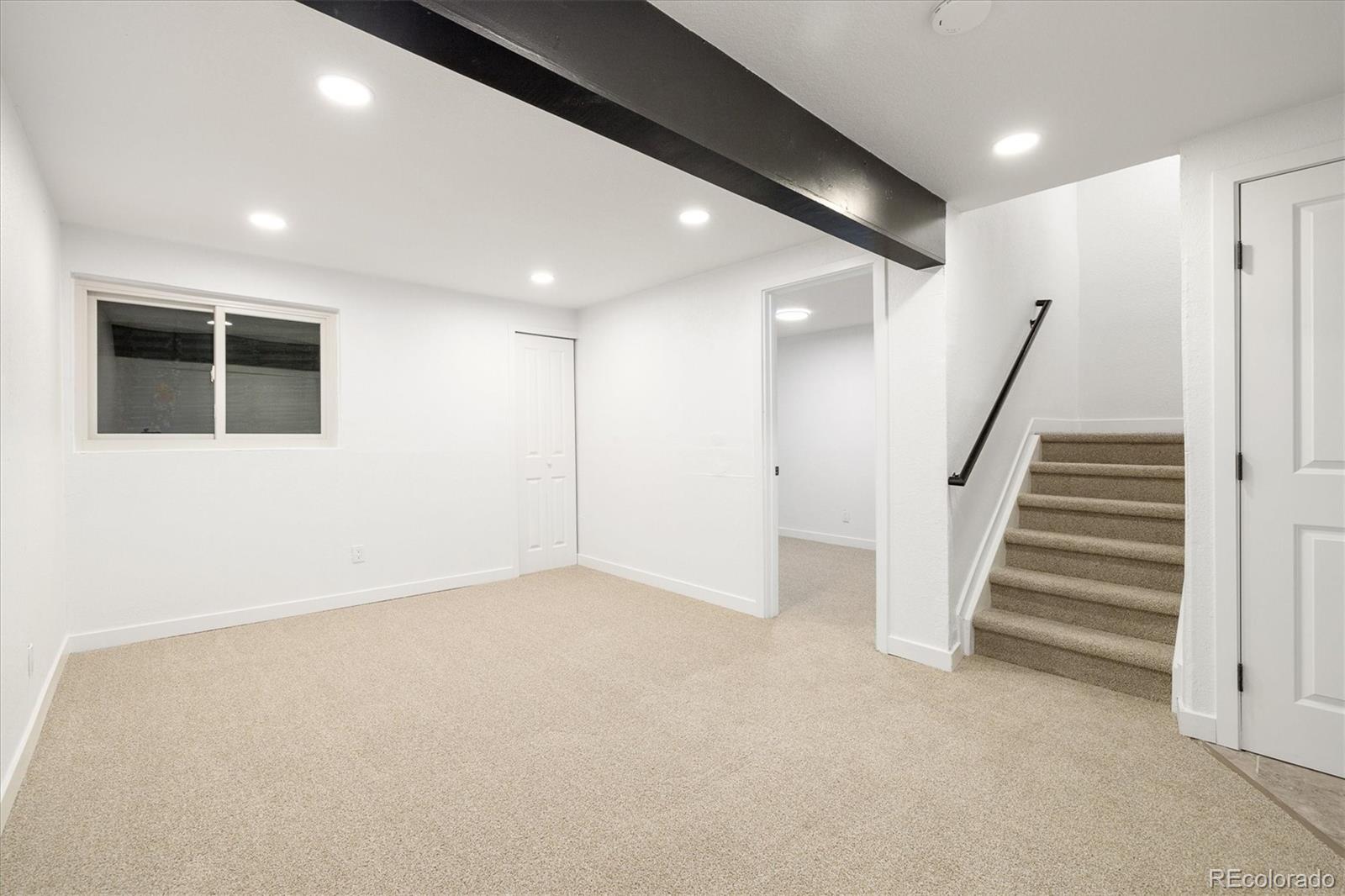 8612 Carr Loop Arvada, CO 80005 - Photo 18 of 35 an entryway in hall