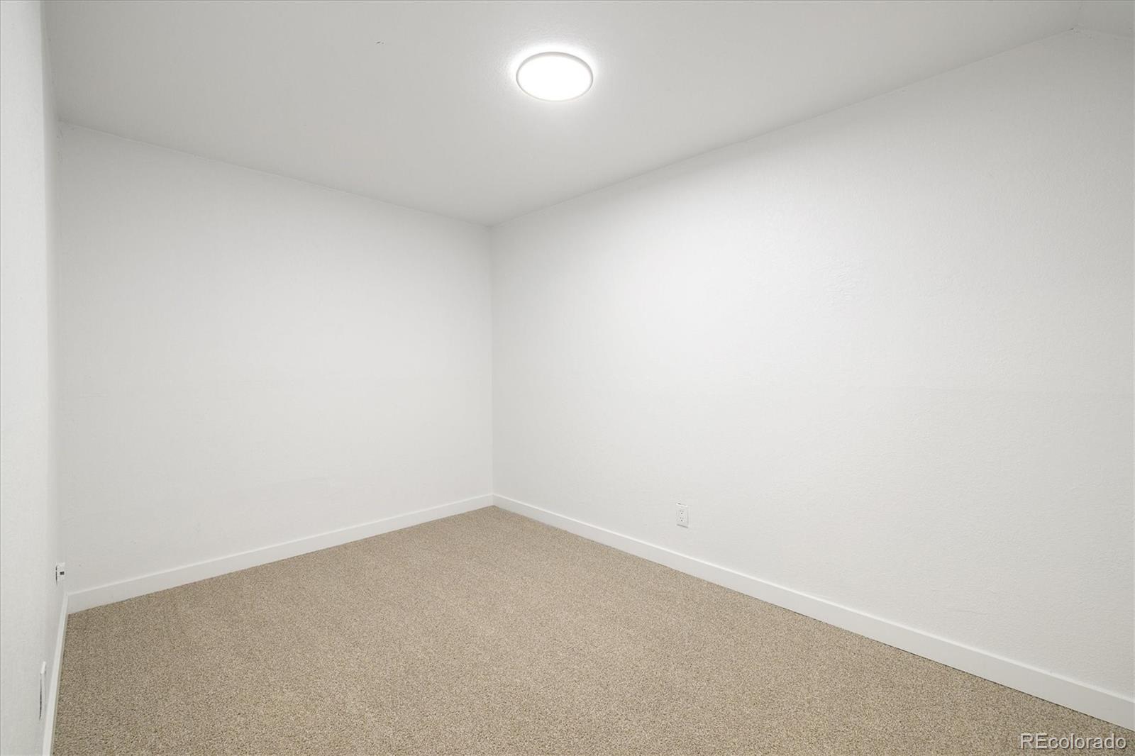 8612 Carr Loop Arvada, CO 80005 - Photo 19 of 35 a view of an empty room