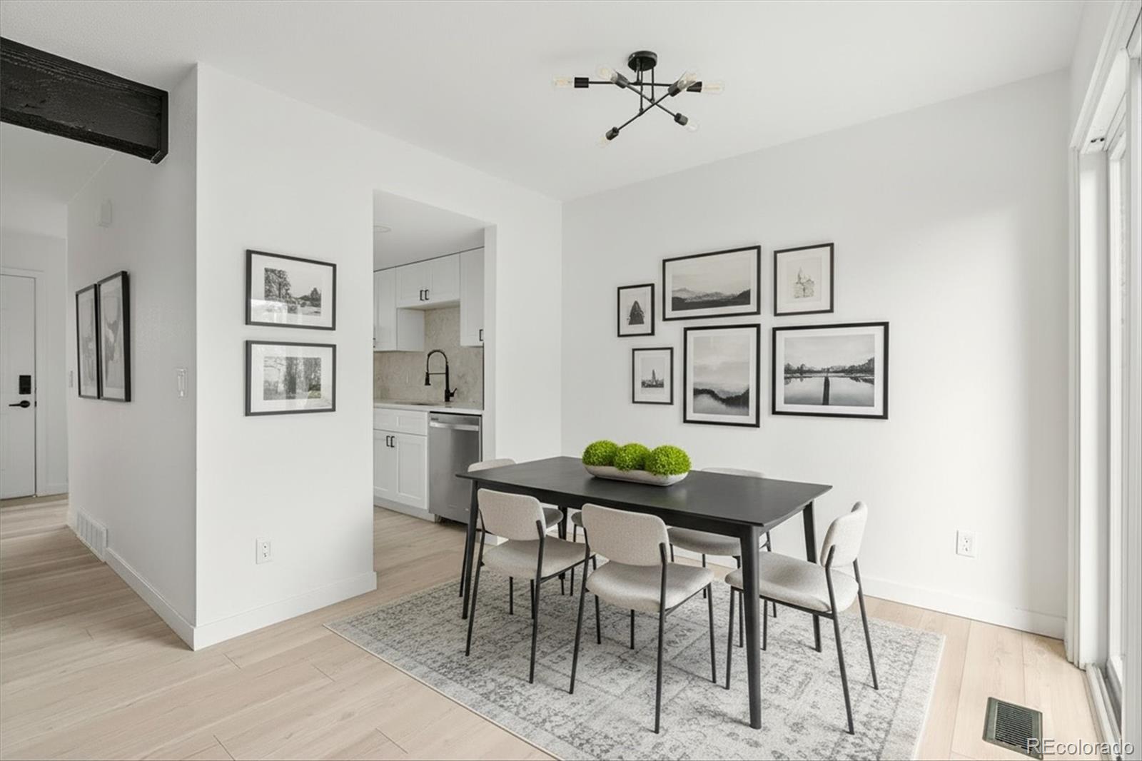 8612 Carr Loop Arvada, CO 80005 - Photo 2 of 35 a view of a dining room with furniture