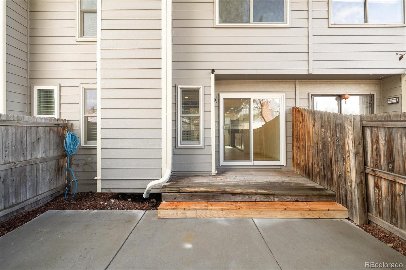 8612 Carr Loop Arvada, CO 80005 - Photo 23 of 35 a view of a house with a outdoor space