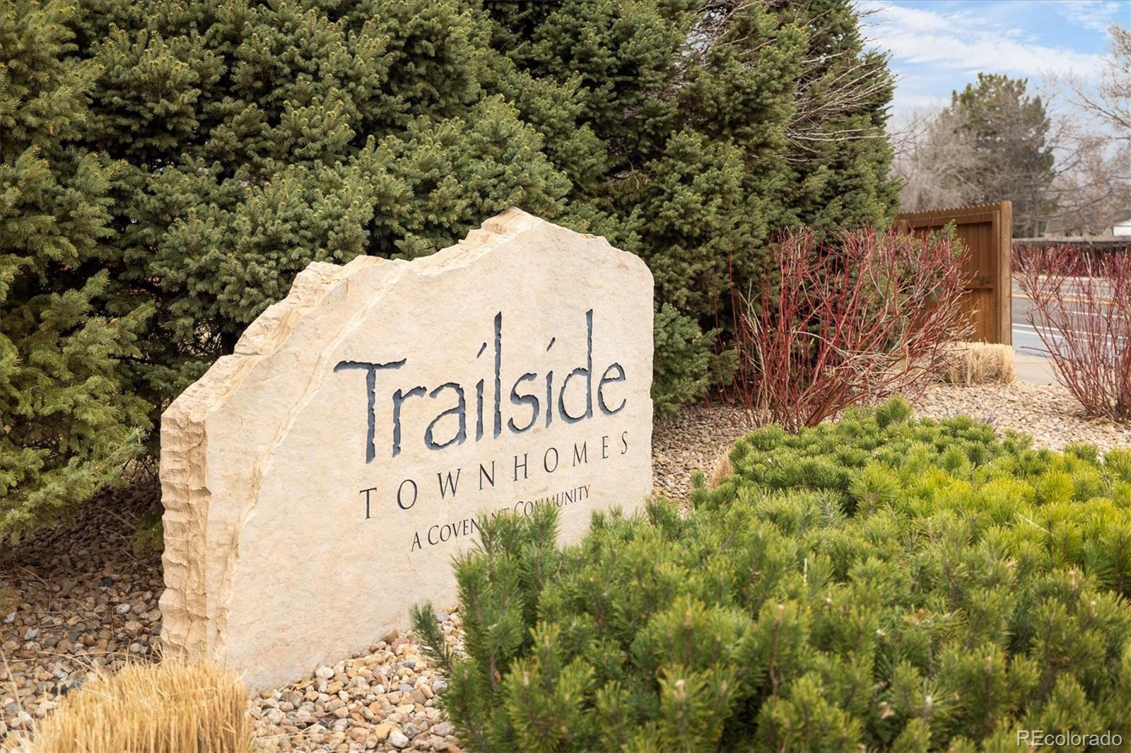 8612 Carr Loop Arvada, CO 80005 - Photo 29 of 35 a sign of golf club on a wall
