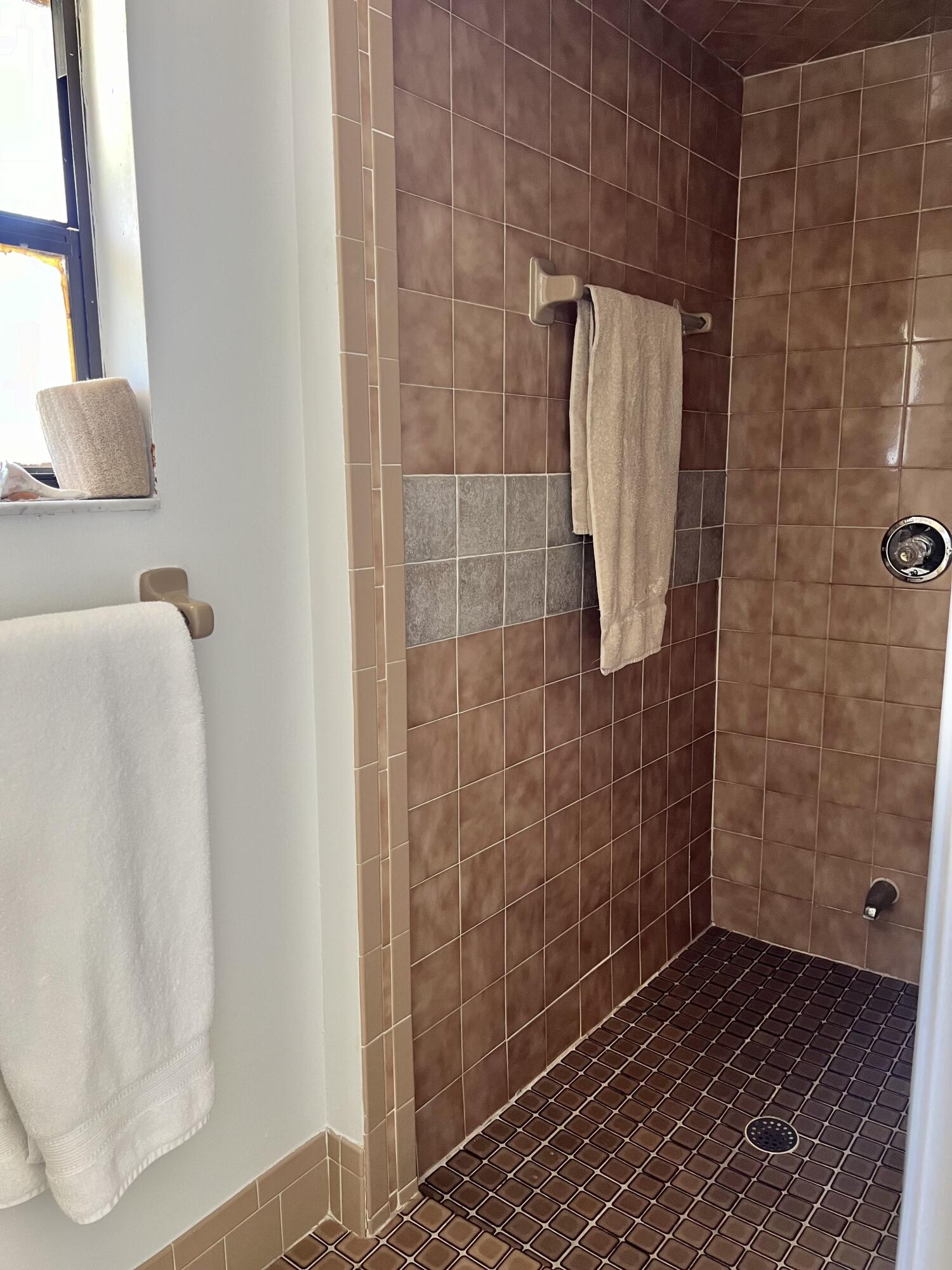 410 Rio Casa Drive South Indialantic, FL 32903 - Photo 10 of 25 a bathroom with a shower