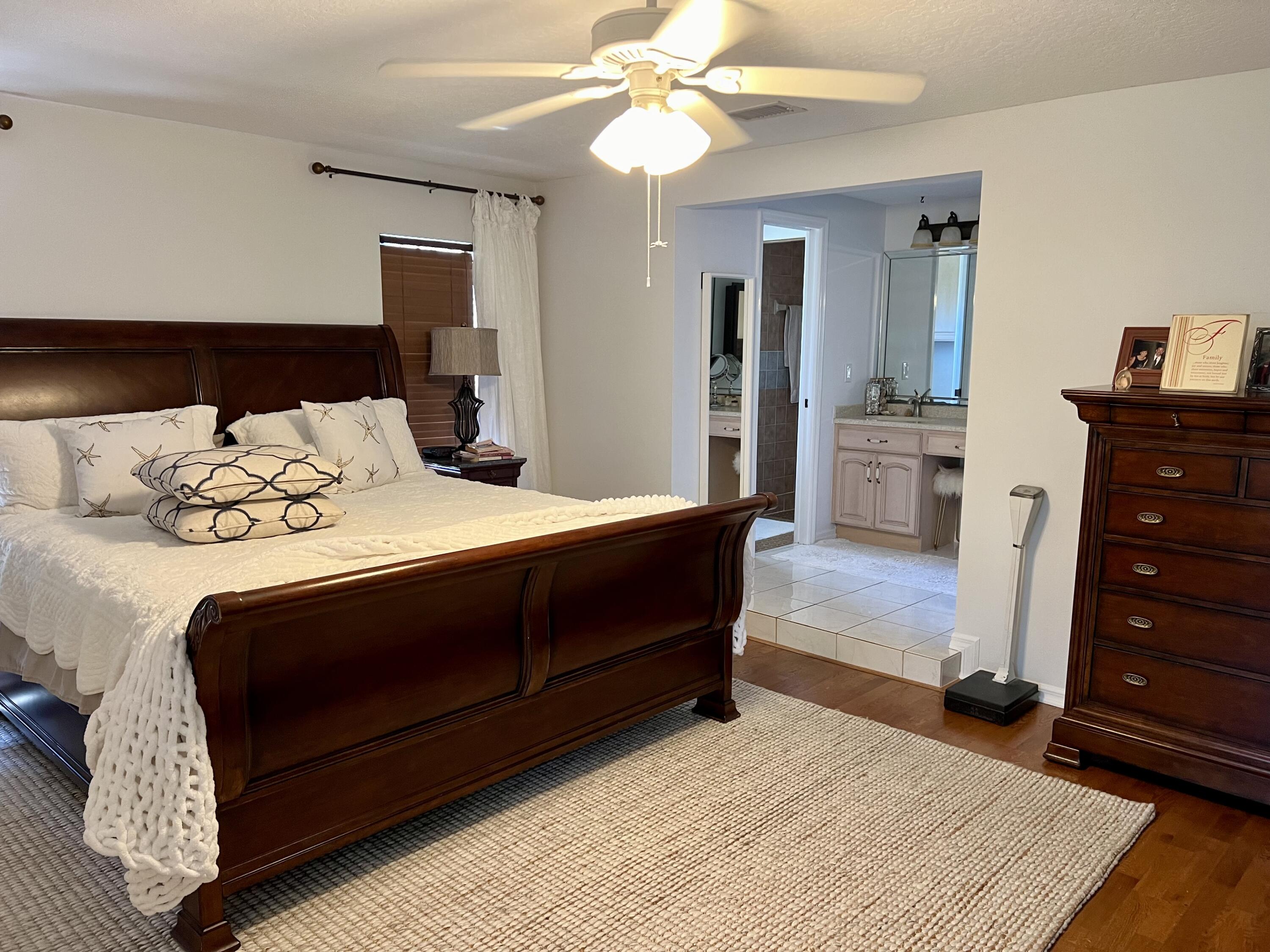 410 Rio Casa Drive South Indialantic, FL 32903 - Photo 12 of 25 a bedroom with a bed and a dresser