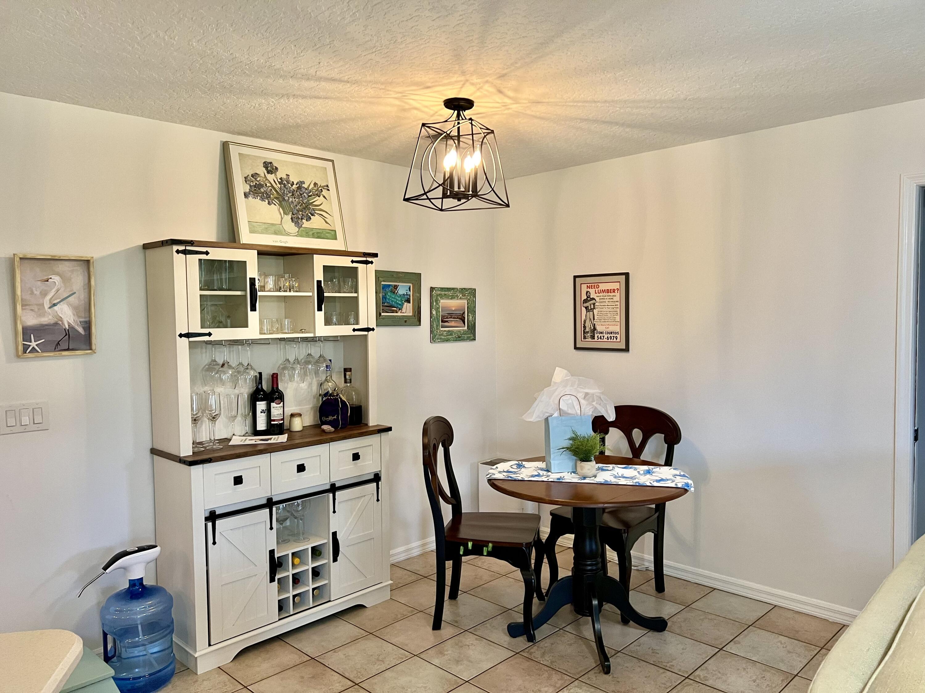 410 Rio Casa Drive South Indialantic, FL 32903 - Photo 13 of 25 a dining room with furniture and window