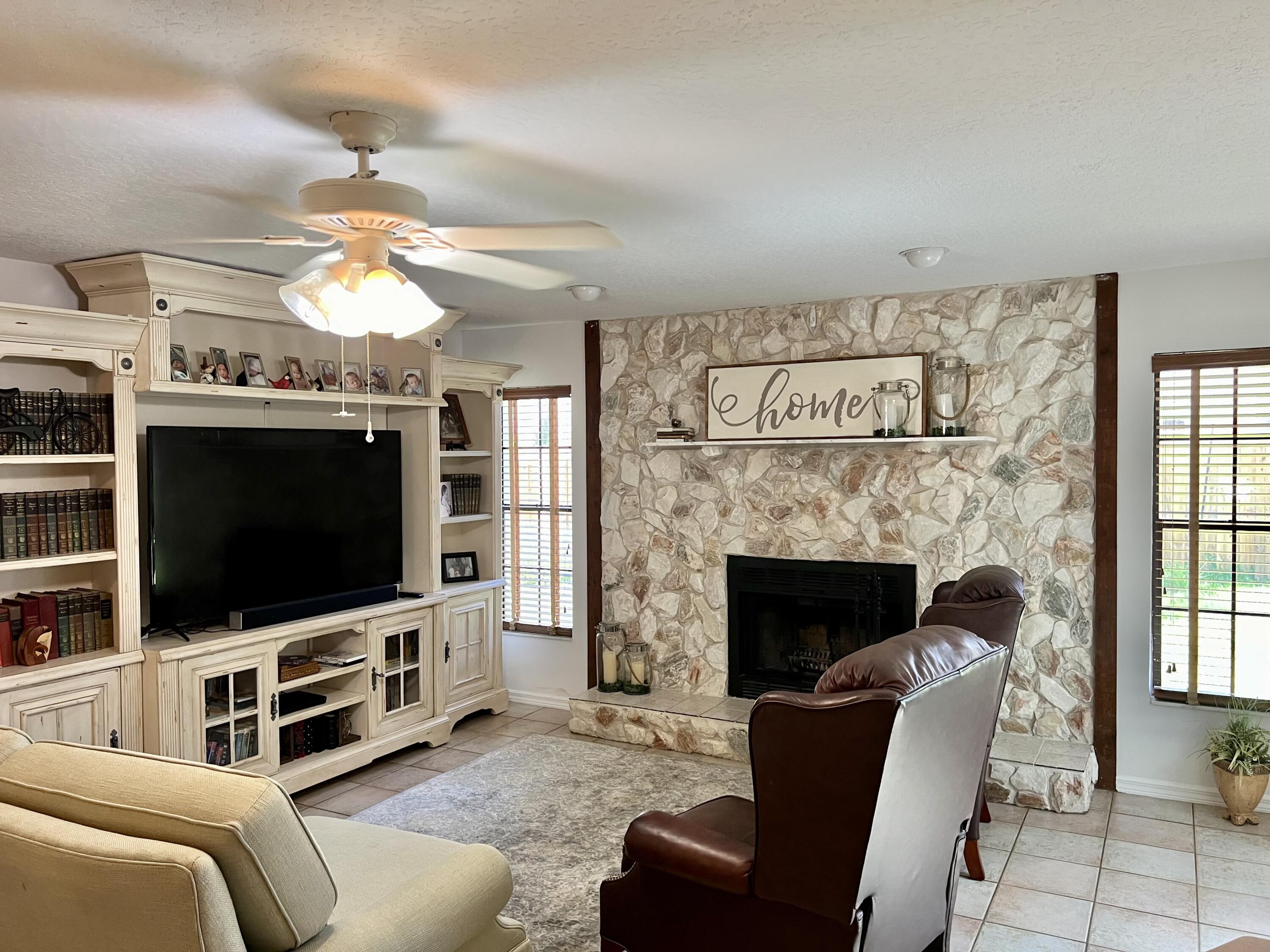 410 Rio Casa Drive South Indialantic, FL 32903 - Photo 15 of 25 a living room with furniture and a flat screen tv
